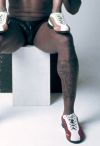 tyson craig beckford leg tattoo